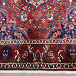 Vintage Saman Bakhtiari Rug, close-up of the border and fringe, hand-knotted wool pile. SKU EE 1.1233.