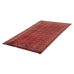 Vintage Turkmen Rug | 7' 1" x 10' 6" — angled view, gallery 01