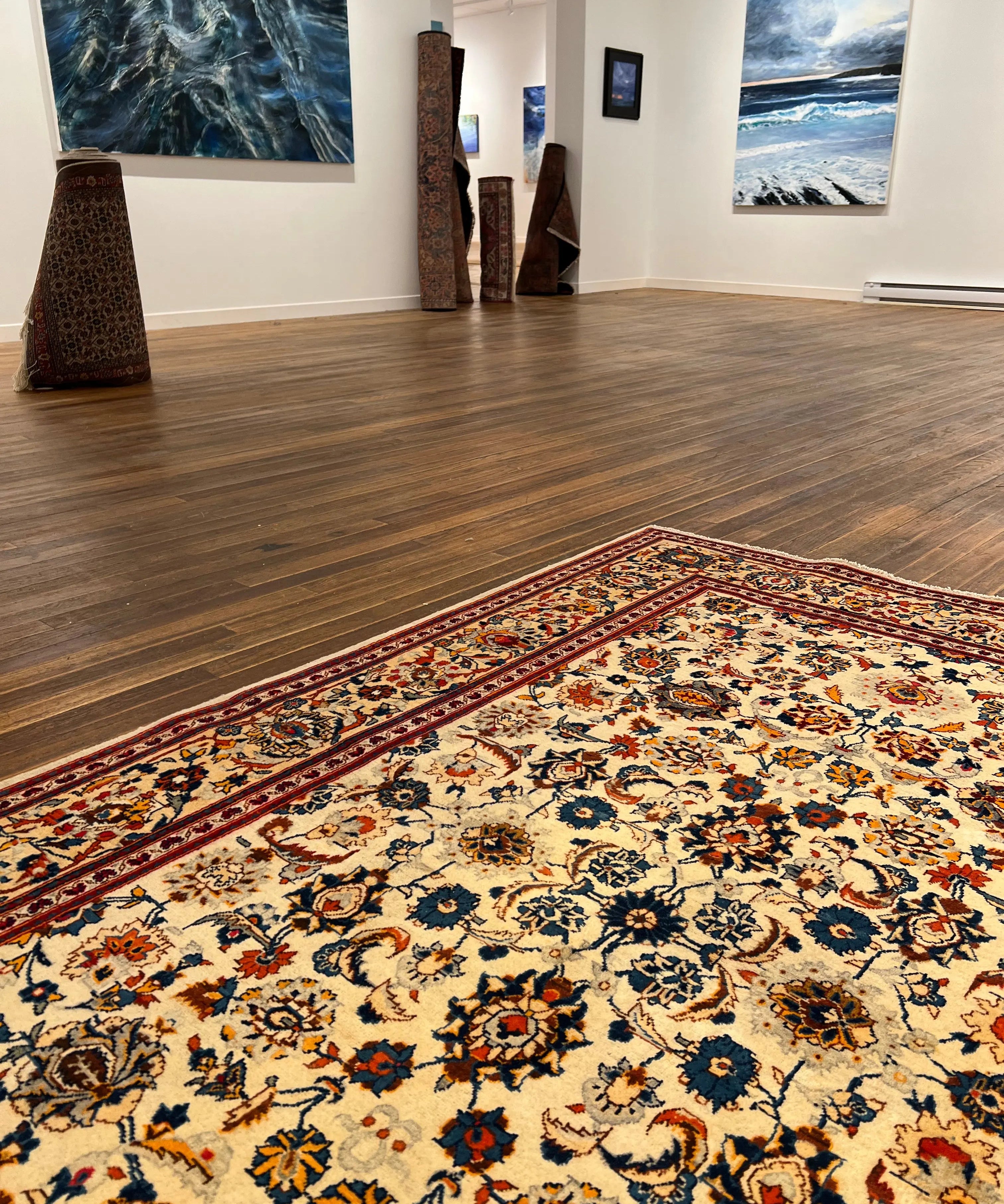 Persian Kashan area rug, cream background with red, blue and gold floral pattern