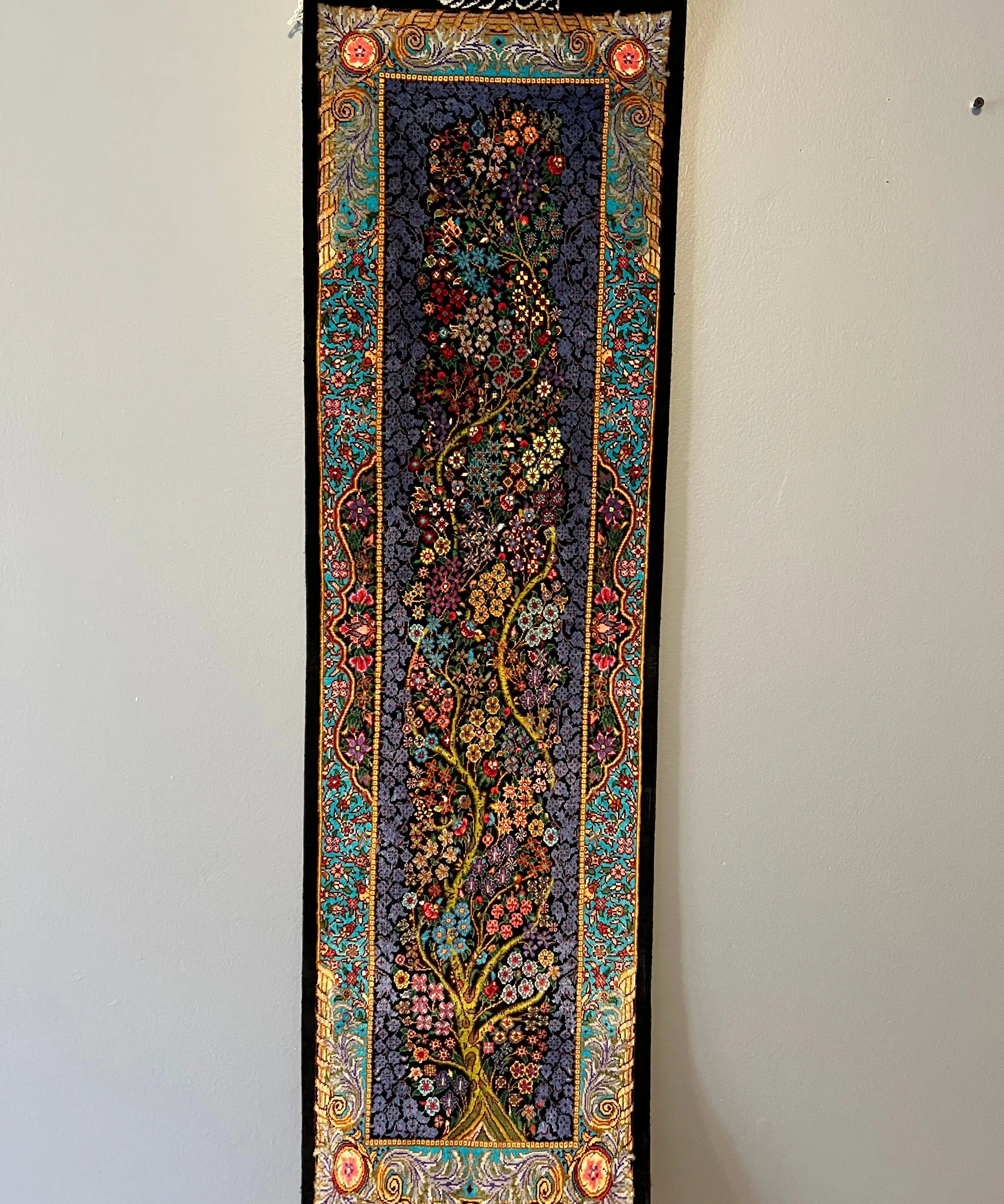 Silk tableau rug, full rectangular dark navy floral design with teal red gold border, fringed top