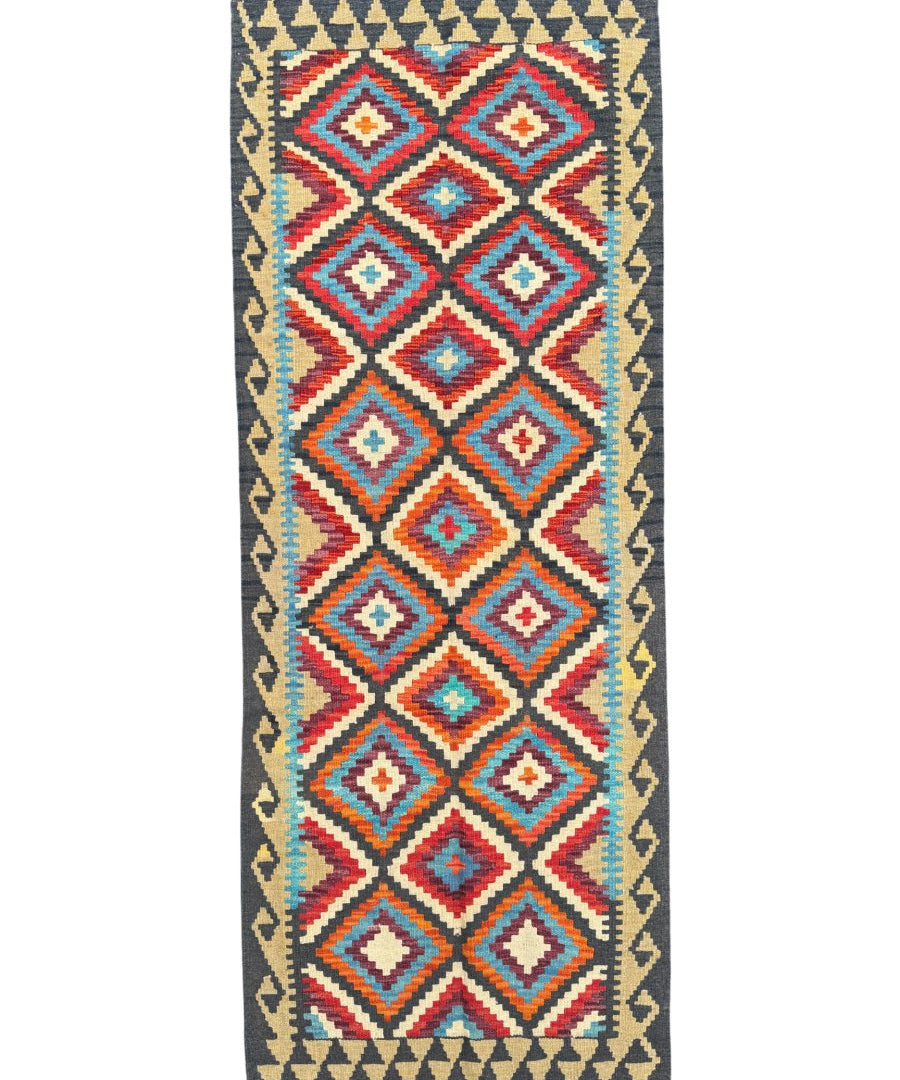 Kilim runner rug with tall geometric diamond lattice pattern and short fringed ends