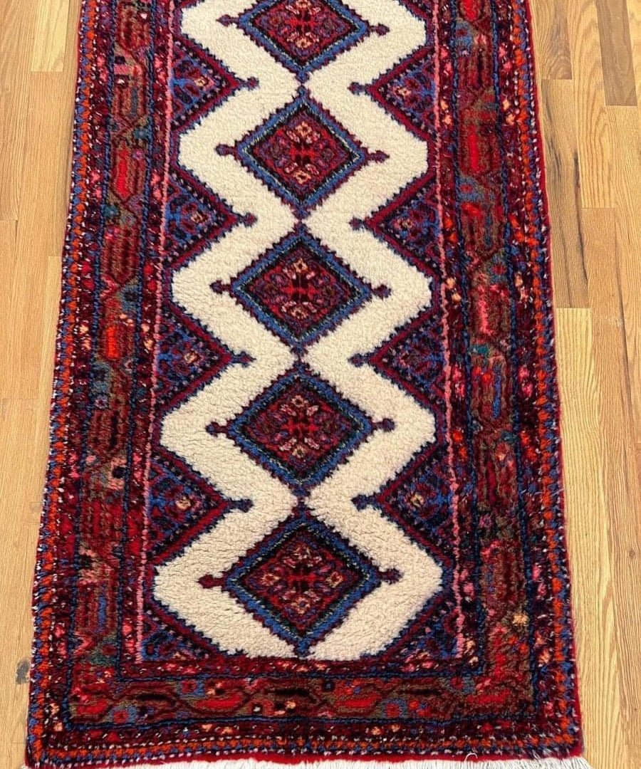 16'2" x 2'8" runner rug, cream diamond medallions in red and navy, fringed ends