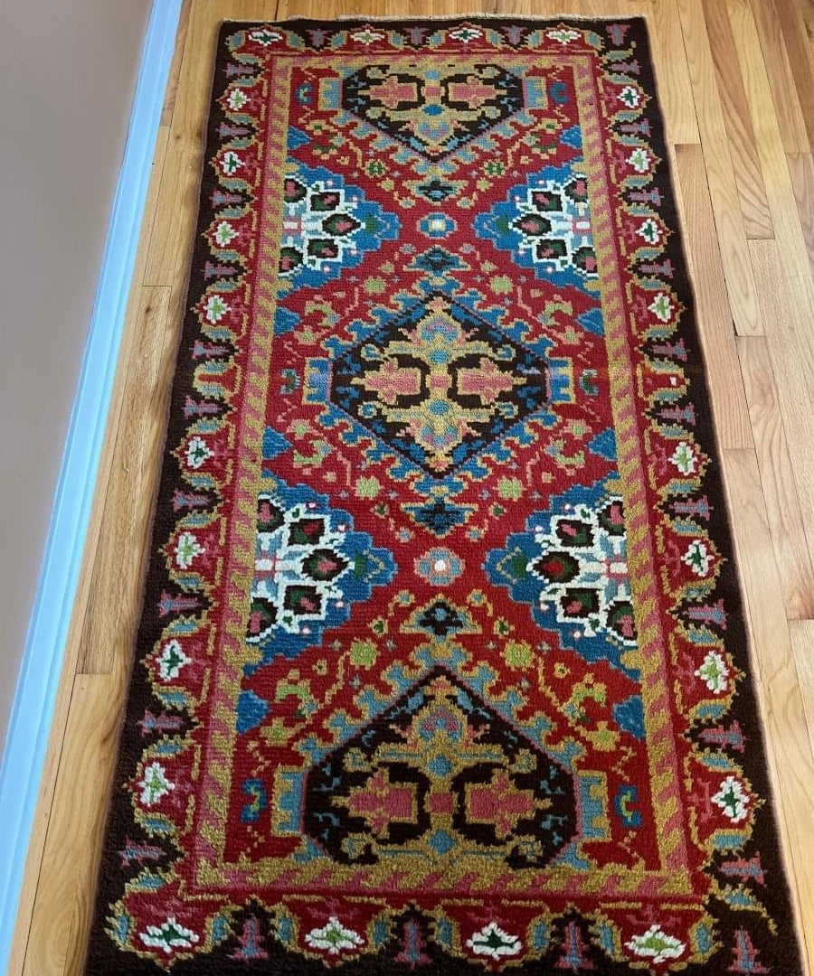 Eastern European rug 6'6" x 3'3", blue-and-red diamond pattern with floral border