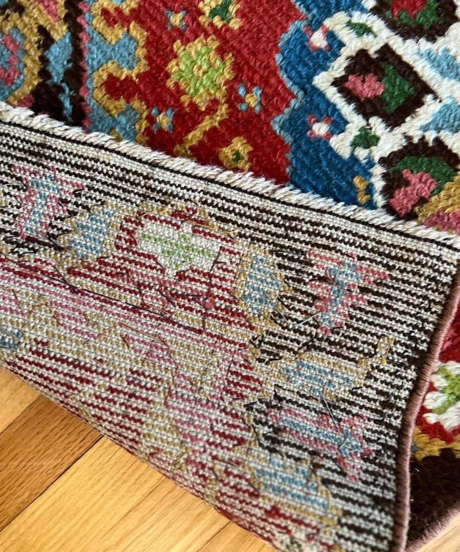Eastern European rug 6'6" x 3'3" close-up of multicolor woven edge and fringe