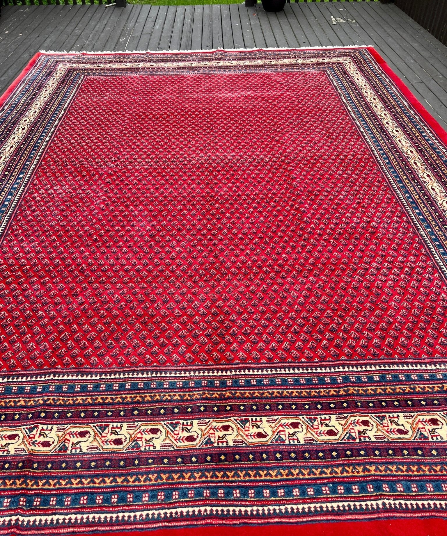 Persian Sarouk Mir rug, red field with blue border stripes, 12'3"x9'3"