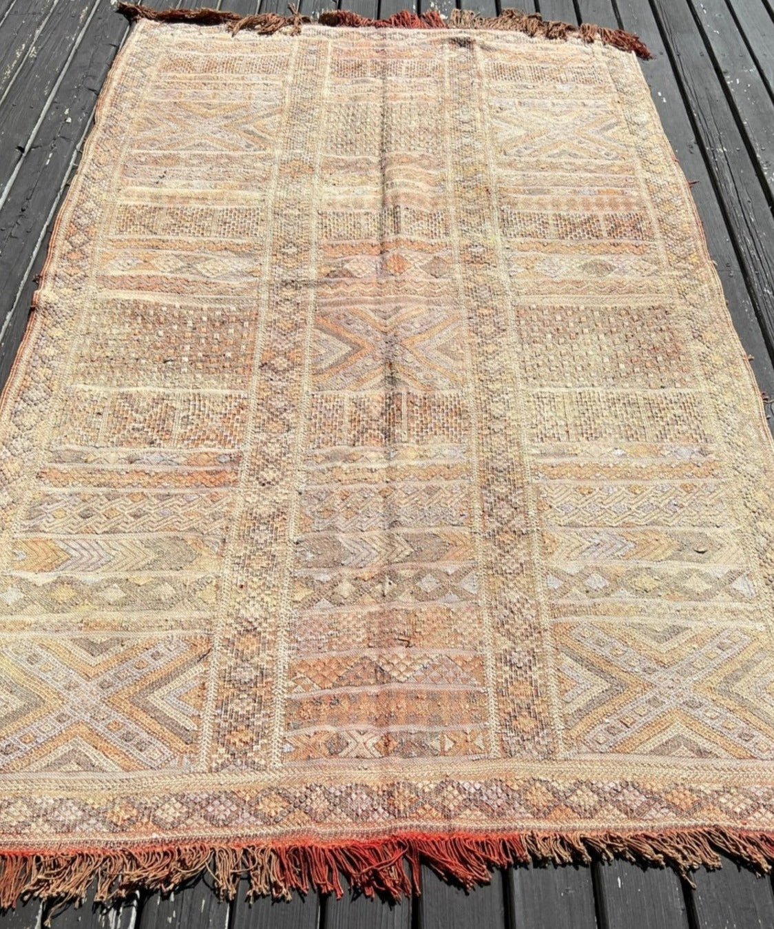 Moroccan woven area rug, beige and tan with geometric motifs, short fringed edges
