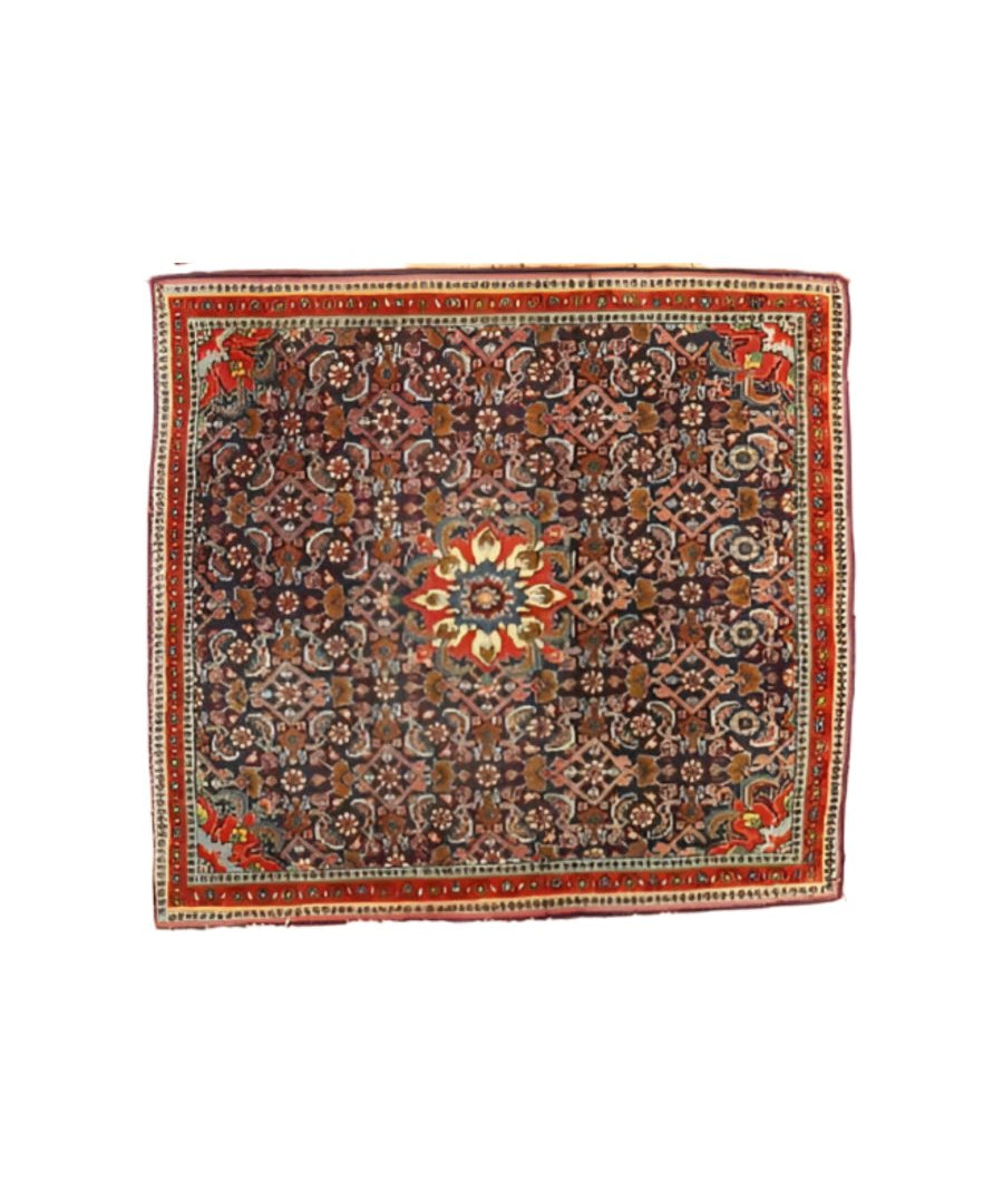 Bijar-style rug with multicolor floral center on dark navy and red outer frame