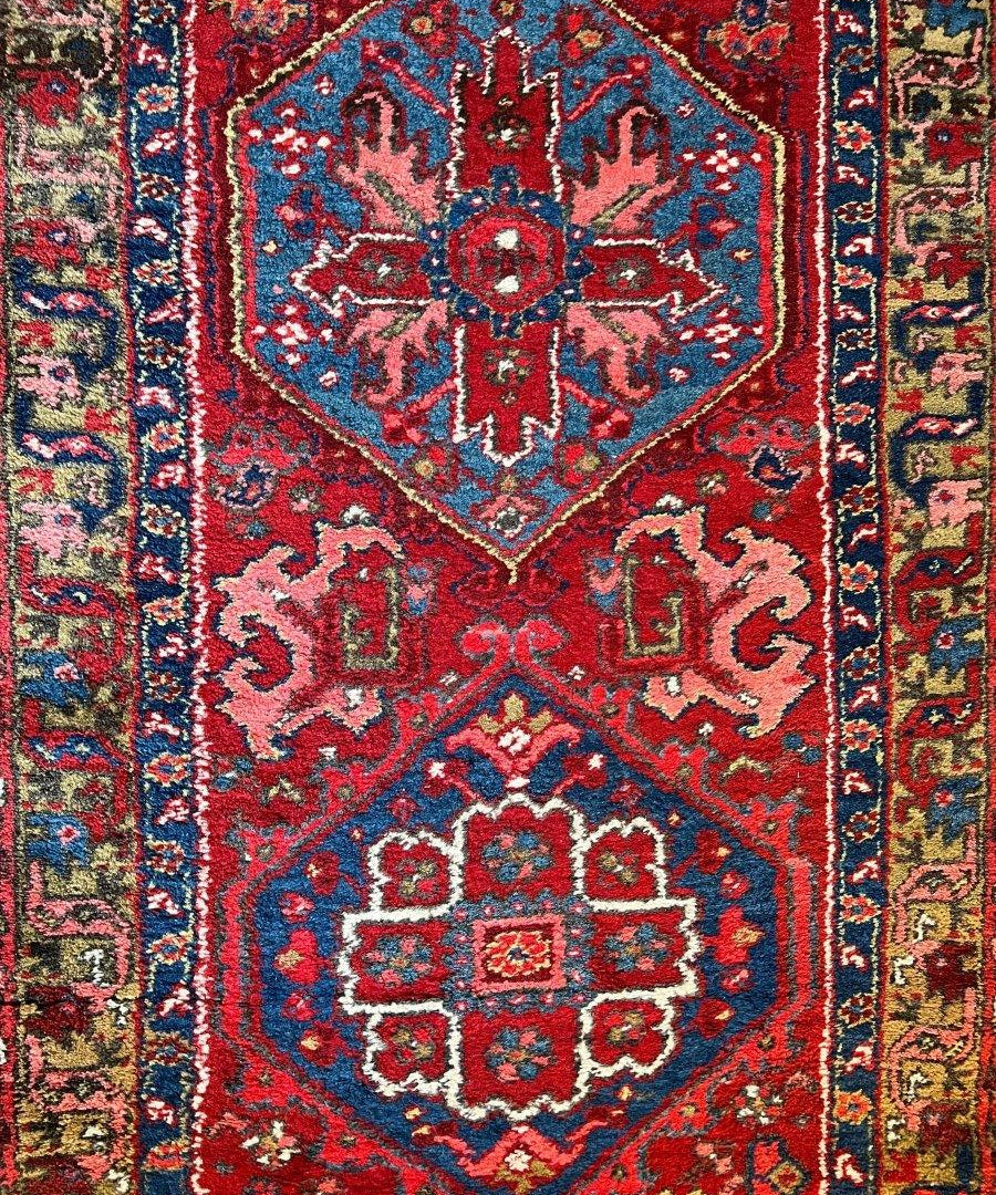 Persian Meshkin rug runner, red and blue geometric medallion pattern, 10'9" x 3'2"