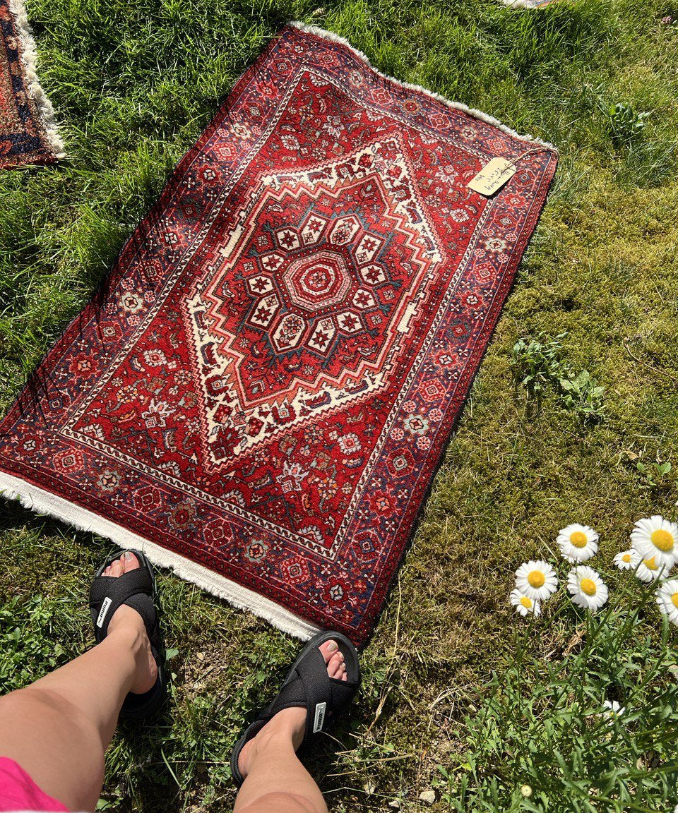 Persian Qoltoq rug, red geometric medallion pattern, 2'6" x 4'1"