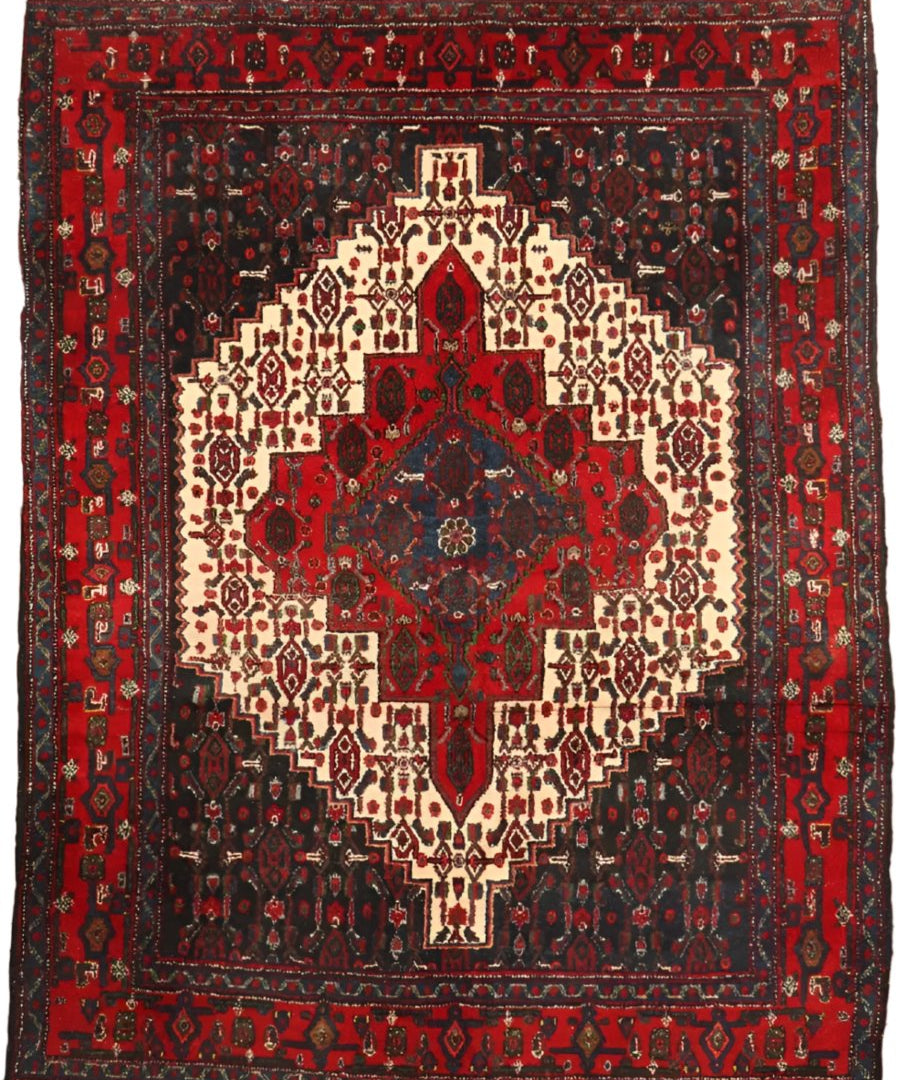 Persian Senneh rug with central diamond medallion, red border, cream and navy motifs