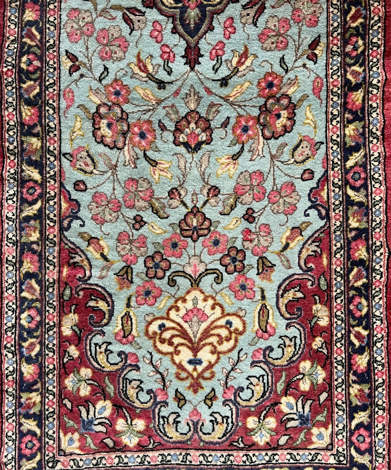 Persian Qom runner rug with detailed floral vines and border stripe, light blue