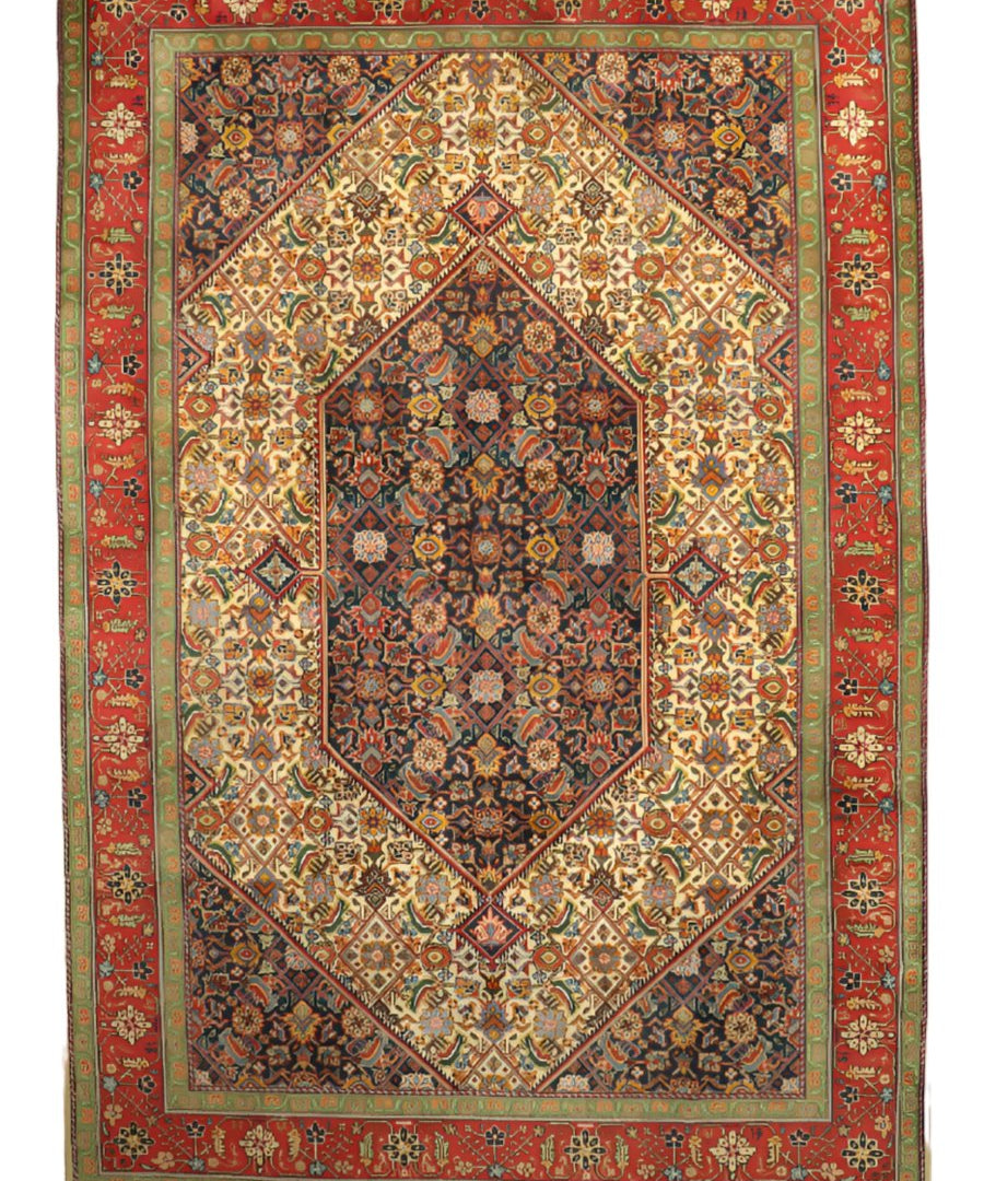 Persian-style area rug with red outer border, cream background, dark blue central diamond medallion