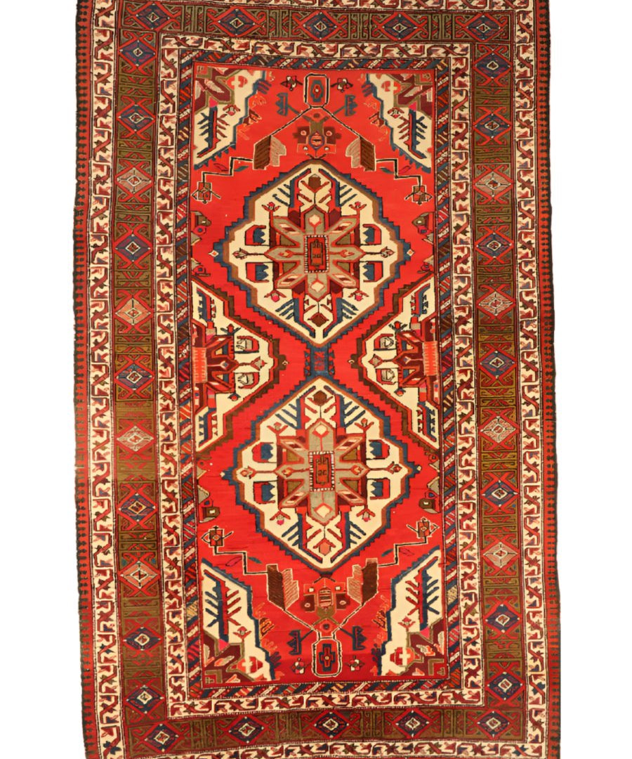 Vintage Persian Meshkin rug rectangle, red field with cream medallions and dark blue accents, fringe