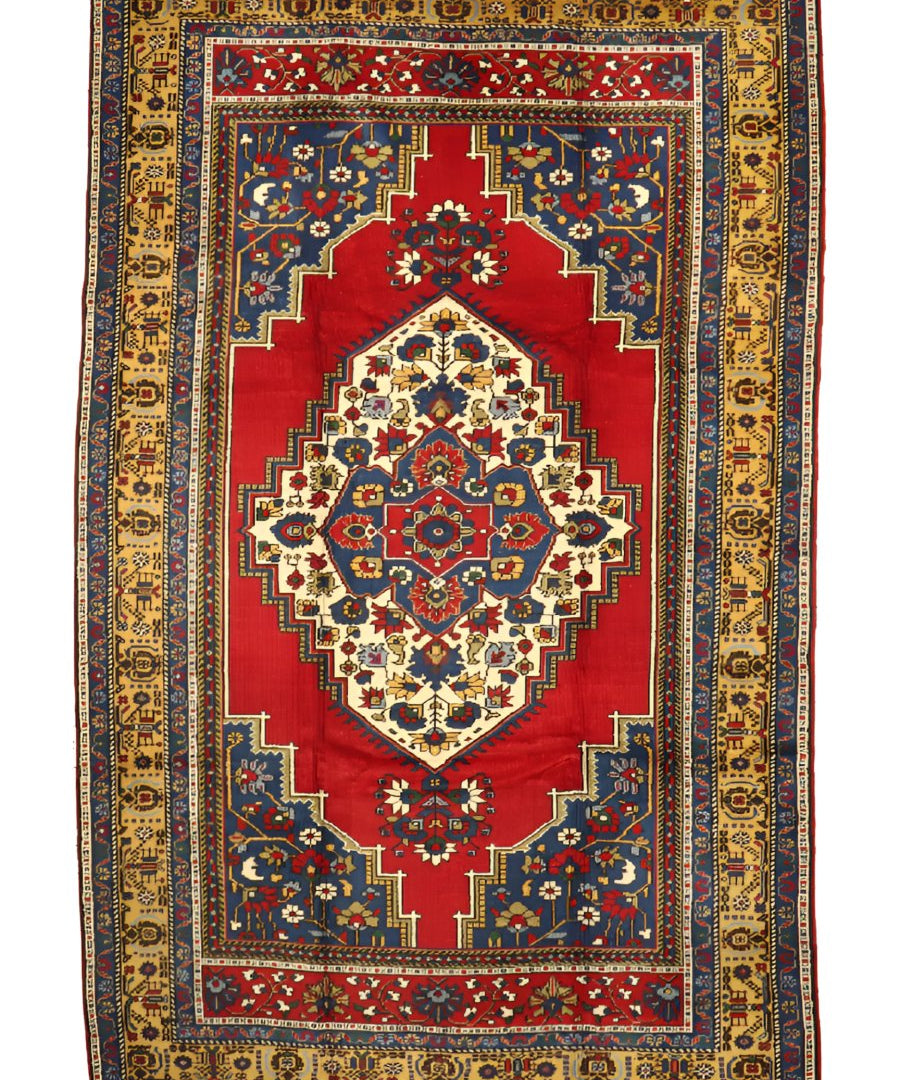 Turkish Taspinar rug featuring red central medallion, blue frame, cream and gold accents