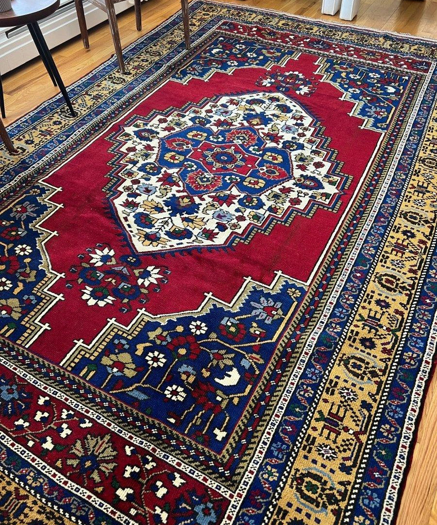 Turkish Taspinar area rug with red center medallion, blue border, cream and gold details